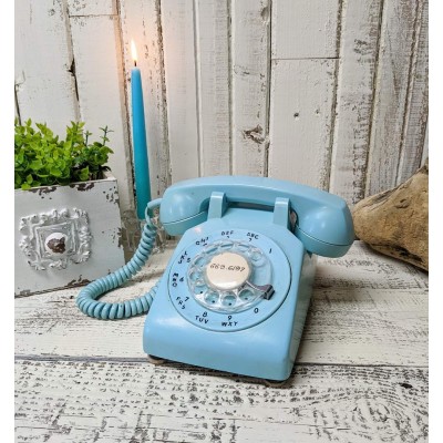 Téléphone bleu vintage à cadran rotatif 